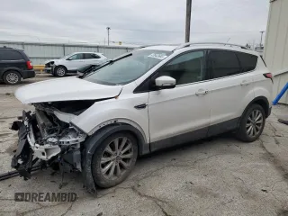 2017 Ford Escape Titanium with VIN 1FMCU0JD1HUE66040, listed as a Copart auction lot 43942665 with 55,484 mi miles and Salvage Title. Bid and sale history available at carsss.com. Image 1.