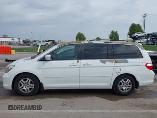 2007 Honda Odyssey Touring with VIN 5FNRL38887B081562, listed as a IAAI auction lot 42000435 with 238,287 mi miles and . Bid and sale history available at DreamBid. Image 15.