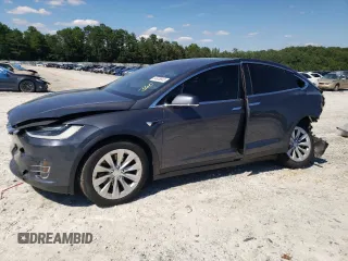 2017 Tesla Model X 90D with VIN 5YJXCDE23HF051027, listed as a Copart auction lot 64608843 with 77,222 mi miles and Salvage Title. Bid and sale history available at DreamBid. Image 1.