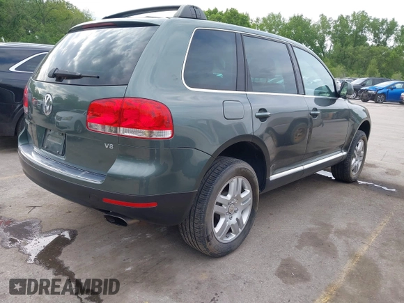 2004 Volkswagen Touareg with VIN WVGCM77L14D045663, listed as a IAAI auction lot 42170895 with 96,709 mi miles and . Bid and sale history available at DreamBid. Image 4.