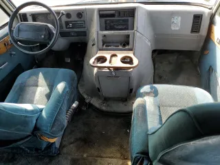 1994 Chevrolet Chevy Van z VIN 1GBEG25K1RF118547, wystawiony jako Copart lot #74319254 z przebiegiem 179 866 mil mil oraz Czysty tytuł • Clean title. Historia ofert i sprzedaży dostępna na DreamBid. Obrazek 8.