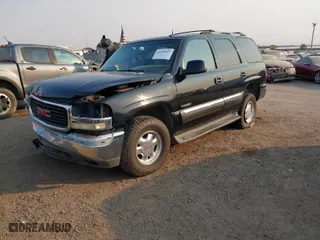 2003 GMC Yukon SLT with VIN 1GKEC13T03R201829, listed as a IAAI auction lot 41391007 with 126,019 mi miles. Bid and sale history available at carsss.com. Image 2.