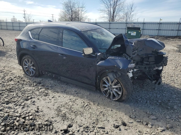 2020 Mazda CX-5 Grand Touring with VIN JM3KFBDM8L0763184, listed as a Copart auction lot 55575105 with 24,855 mi miles and Salvage Title. Bid and sale history available at DreamBid. Image 4.