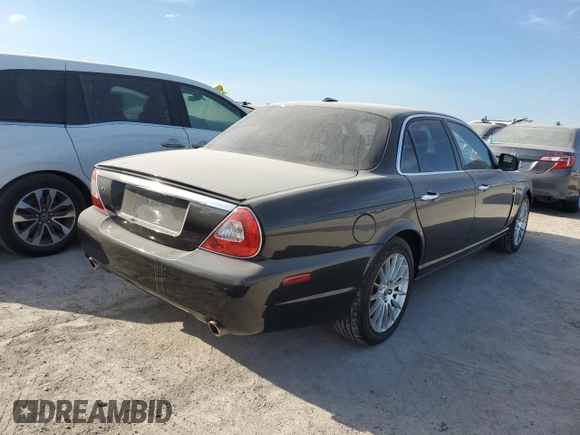 2008 Jaguar XJ with VIN SAJWA71B18SH25255, listed as a Copart auction lot 74781714 with 31,233 mi miles and Salvage Title. Bid and sale history available at carsss.com. Image 3.