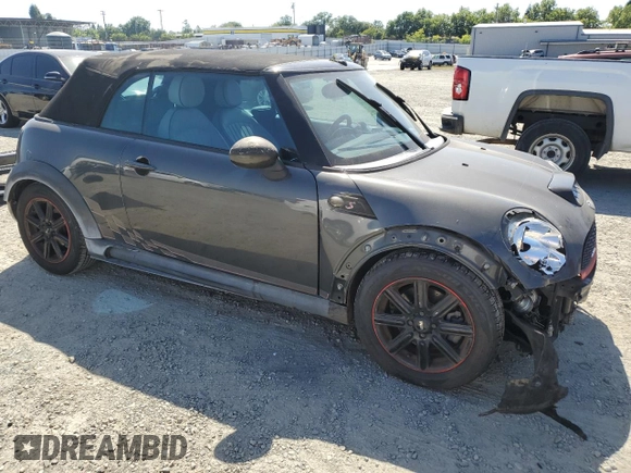 2011 MINI Convertible S с VIN WMWZP3C59BT249133, выставлен на аукционе Copart как лот 56402615 с пробегом 103 809 миль миль и Списание • Salvage title. История ставок и продаж доступна на DreamBid. Изображение 4.