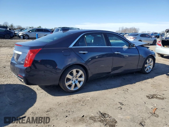 2015 Cadillac CTS Premium AWD z VIN 1G6AZ5S34F0136707, wystawiony jako Copart lot #44146635 z przebiegiem 30 345 mil mil oraz Szkoda całkowita • Salvage title. Historia ofert i sprzedaży dostępna na DreamBid. Obrazek 3.