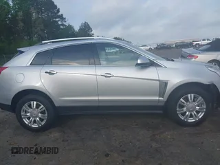 2015 Cadillac SRX Luxury Collection with VIN 3GYFNBE3XFS612048, listed as a IAAI auction lot 41923525 with 154,621 mi miles. Bid and sale history available at carsss.com. Image 13.