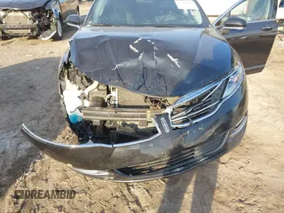 2015 Lincoln MKZ z VIN 3LN6L2J96FR619104, wystawiony jako IAAI lot #41794707 z przebiegiem 140 899 mil mil oraz . Historia ofert i sprzedaży dostępna na DreamBid. Obrazek 6.