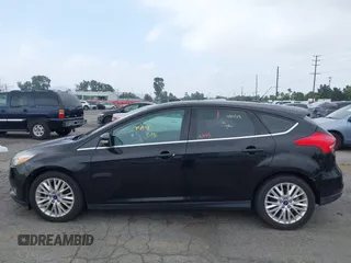 2017 Ford Focus Titanium with VIN 1FADP3N2XHL230766, listed as a IAAI auction lot 42386275 with 64,138 mi miles and . Bid and sale history available at DreamBid. Image 14.