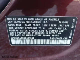 2013 Volkswagen Passat TDI SEL Premium with VIN 1VWCN7A33DC031549, listed as a IAAI auction lot 40313029 with 104,184 mi miles. Bid and sale history available at carsss.com. Image 9.