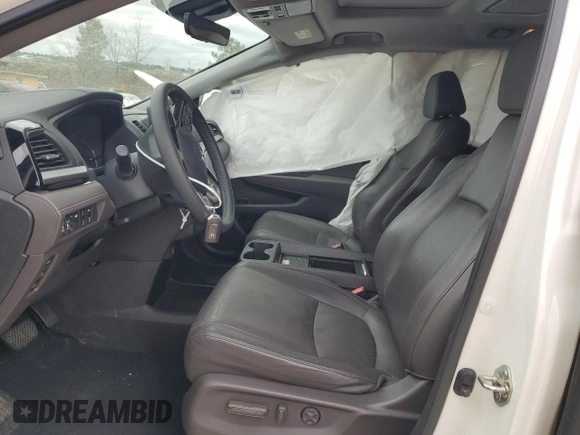 2019 Honda Odyssey Elite with VIN 5FNRL6H99KB013578, listed as a Copart auction lot 49246685 with 54,025 mi miles and Salvage title. Bid and sale history available at DreamBid. Image 7.