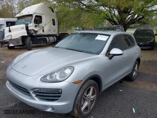 2012 Porsche Cayenne S Hybrid with VIN WP1AE2A2XCLA90082, listed as a IAAI auction lot 41960714 with 139,081 mi miles. Bid and sale history available at carsss.com. Image 21.