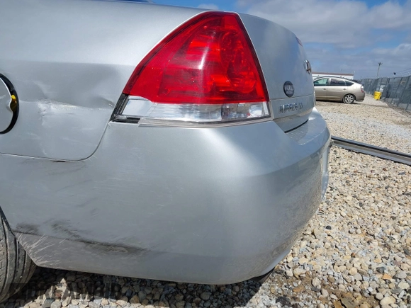 2013 Chevrolet Impala LT with VIN 2G1WG5E36D1235835, listed as a IAAI auction lot 41866890 with 121,742 mi miles and . Bid and sale history available at DreamBid. Image 13.
