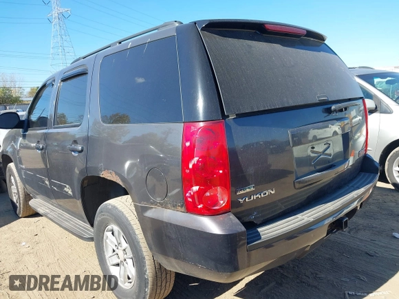 2011 GMC Yukon SLE with VIN 1GKS2AE04BR207818, listed as a IAAI auction lot 40669731 with 312,959 mi miles. Bid and sale history available at carsss.com. Image 3.