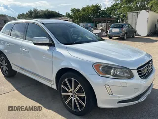 2015 Volvo XC60 T6 Drive-E Platinum z VIN YV449MDM9F2758814, wystawiony jako Copart lot #56789665 z przebiegiem 122 464 mil mil oraz Czysty tytuł • Clean title. Historia ofert i sprzedaży dostępna na DreamBid. Obrazek 1.