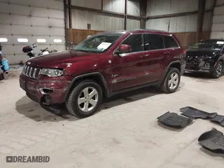 2018 Jeep Grand Cherokee Laredo E with VIN 1C4RJFAG9JC359284, listed as a IAAI auction lot 41032232 with 163,679 mi miles. Bid and sale history available at carsss.com. Image 17.