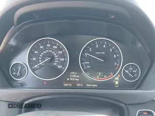 2014 BMW 3 Series 328i with VIN WBA3C1C51EK115278, listed as a IAAI auction lot 41979591 with 129,112 mi miles. Bid and sale history available at carsss.com. Image 7.
