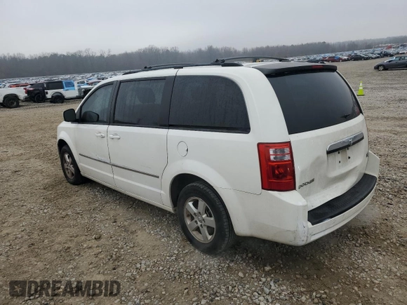 2010 Dodge Grand Caravan SXT with VIN 2D4RN5D12AR244722, listed as a Copart auction lot 43725005 with 210,546 mi miles and Clean Title. Bid and sale history available at DreamBid. Image 2.