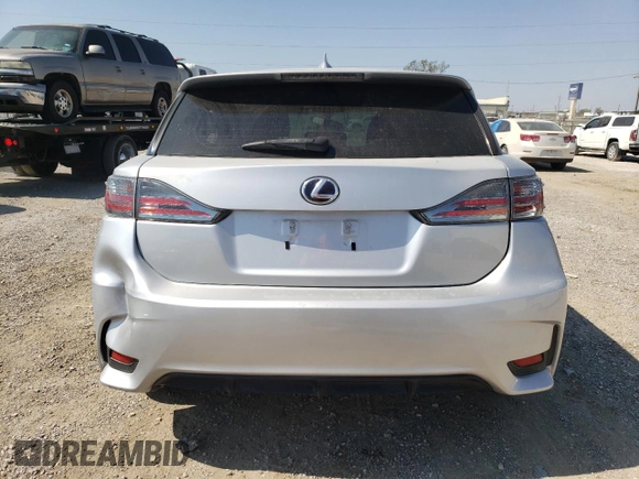 2014 Lexus CT 200h z VIN JTHKD5BH9E2186144, wystawiony jako Copart lot #75470904 z przebiegiem 125 062 mil mil oraz Szkody całkowita. Historia ofert i sprzedaży dostępna na DreamBid. Obrazek 6.