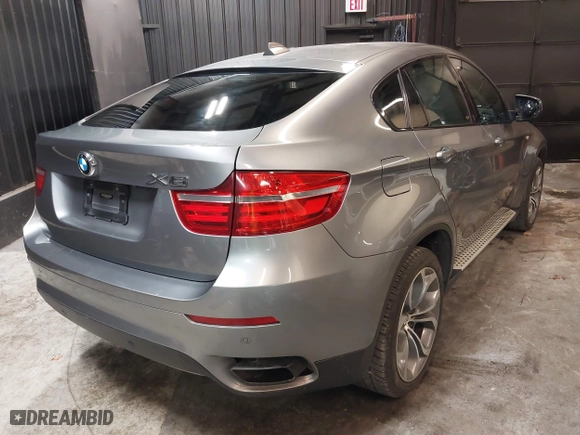 2014 BMW X6 50i with VIN 5UXFG8C55EL592995, listed as a IAAI auction lot 41724960 with 137,112 mi miles. Bid and sale history available at carsss.com. Image 4.