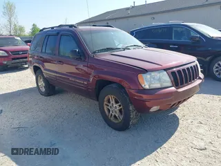 1999 Jeep Grand Cherokee Limited with VIN 1J4GW68N0XC723544, listed as a IAAI auction lot 42109452 with 130,000 mi miles and . Bid and sale history available at DreamBid. Image 1.