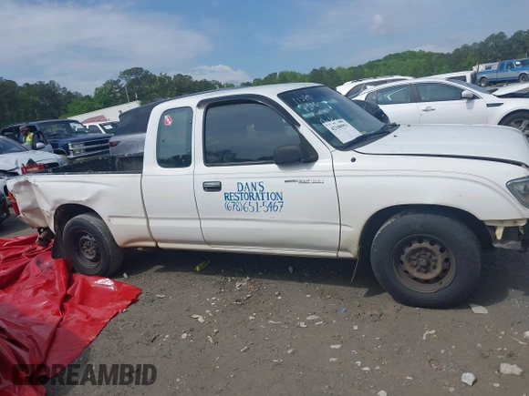 1995 Toyota Tacoma with VIN 4TAUN53B2SZ019575, listed as a IAAI auction lot 42100951 with 270,058 mi miles and . Bid and sale history available at DreamBid. Image 13.