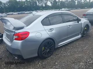 2020 Subaru WRX STI Limited with VIN JF1VA2Y6XL9806022, listed as a IAAI auction lot 39980273 with 143,889 mi miles. Bid and sale history available at carsss.com. Image 4.