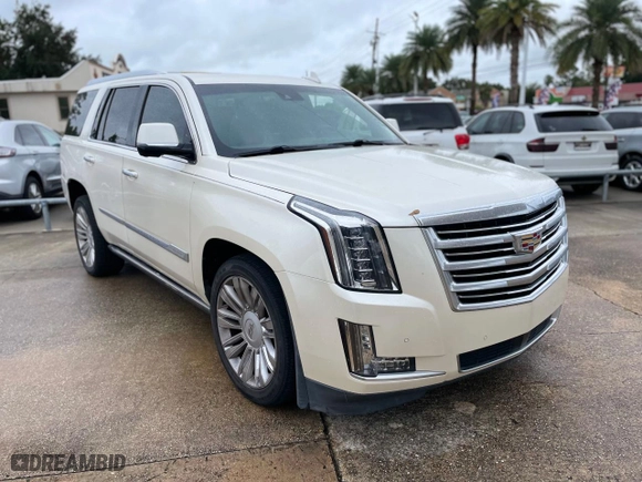 2015 Cadillac Escalade Platinum with VIN 1GYS3PKJ9FR598926, listed as a Copart auction lot 71994334 with 119,715 mi miles and Salvage Title. Bid and sale history available at carsss.com. Image 1.