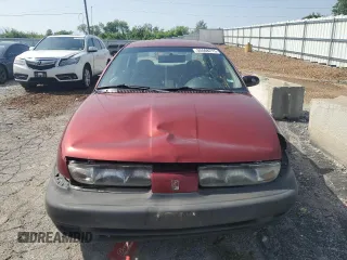 1999 Saturn SL z VIN 1G8ZH5288XZ273509, wystawiony jako Copart lot #55508215 z przebiegiem 168 946 mil mil oraz Szkoda całkowita • Salvage title. Historia ofert i sprzedaży dostępna na DreamBid. Obrazek 5.