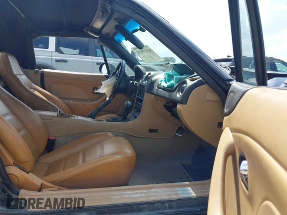 2002 Mazda MX-5 Miata Cloth with VIN JM1NB353520221312, listed as a IAAI auction lot 42410028 with 99,375 mi miles and . Bid and sale history available at DreamBid. Image 5.
