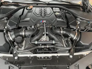 2023 BMW M8 Competition with VIN WBSDZ0C07PCK30073, listed as a Copart auction lot 49407825 with 999,999 mi miles and Salvage Title. Bid and sale history available at carsss.com. Image 7.