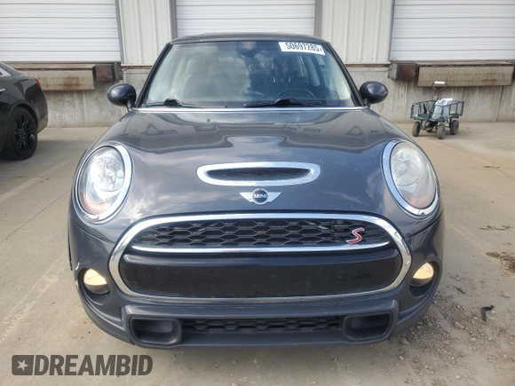 2015 MINI Hardtop S with VIN WMWXP7C59F2A34428, listed as a Copart auction lot 50697285 with 131,564 mi miles and Salvage Title. Bid and sale history available at DreamBid. Image 5.