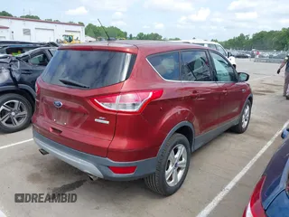 2014 Ford Escape SE with VIN 1FMCU0GX4EUD02407, listed as a IAAI auction lot 42156731 with 114,117 mi miles. Bid and sale history available at carsss.com. Image 4.
