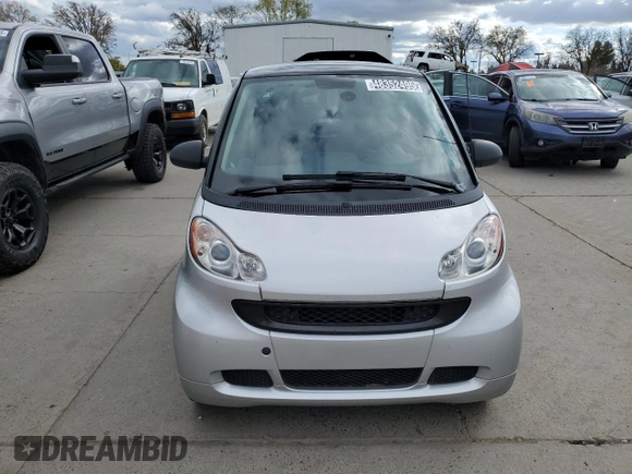2012 Smart fortwo Pure z VIN WMEEJ3BA2CK549445, wystawiony jako Copart lot #48352495 z przebiegiem 53 406 mil mil oraz Tytuł czysty. Historia ofert i sprzedaży dostępna na DreamBid. Obrazek 5.