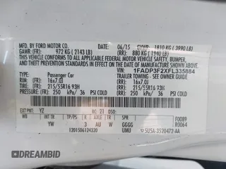 2015 Ford Focus SE with VIN 1FADP3F2XFL335884, listed as a IAAI auction lot 42582740 with 102,036 mi miles and . Bid and sale history available at DreamBid. Image 9.