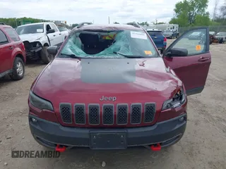 2020 Jeep Cherokee Trailhawk z VIN 1C4PJMBX8LD619813, wystawiony jako IAAI lot #42366066 z przebiegiem 69 811 mil mil oraz . Historia ofert i sprzedaży dostępna na DreamBid. Obrazek 6.