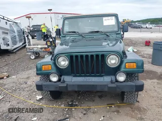 1999 Jeep Wrangler Sahara with VIN 1J4FY49S5XP482037, listed as a IAAI auction lot 42341723 with 161,081 mi miles and . Bid and sale history available at DreamBid. Image 13.