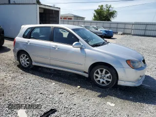 2005 Kia Spectra with VIN KNAFE162155081155, listed as a Copart auction lot 53893255 with 127,937 mi miles and Salvage Title. Bid and sale history available at carsss.com. Image 4.