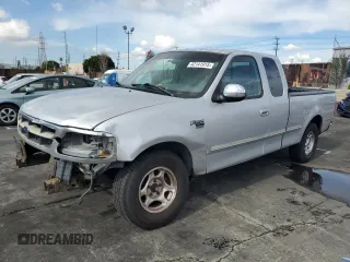 1998 Ford F-150 XL with VIN 1FTRX17L3WKB36791, listed as a Copart auction lot 42141915 with 201,067 mi miles and Salvage title. Bid and sale history available at DreamBid. Image 1.