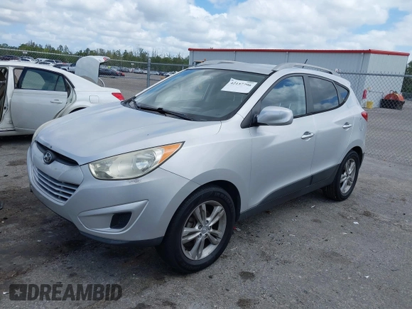 2010 Hyundai Tucson GLS with VIN KM8JU3AC0AU019205, listed as a IAAI auction lot 42157796 with 175,246 mi miles and . Bid and sale history available at DreamBid. Image 2.