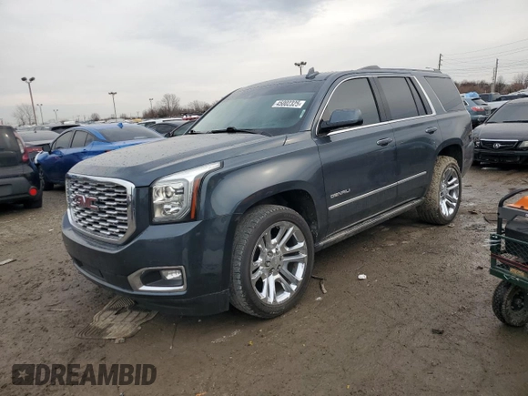 2019 GMC Yukon Denali with VIN 1GKS2CKJ3KR378827, listed as a Copart auction lot 45002325 with 74,283 mi miles and Salvage Title. Bid and sale history available at carsss.com. Image 1.