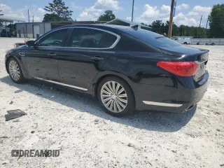 2015 Kia K900 Premium z VIN KNALU4D41F6027488, wystawiony jako Copart lot #65242944 z przebiegiem 102 747 mil mil oraz Szkody całkowita. Historia ofert i sprzedaży dostępna na DreamBid. Obrazek 2.