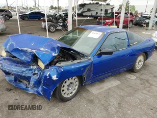 1990 Nissan 240SX z VIN JN1HS36P4LW126417, wystawiony jako IAAI lot #42065073 z przebiegiem 284 437 mil mil oraz . Historia ofert i sprzedaży dostępna na DreamBid. Obrazek 2.