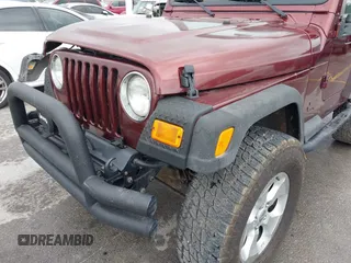2003 Jeep Wrangler Sport with VIN 1J4FA49S63P324904, listed as a IAAI auction lot 42138001 with 170,917 mi miles and . Bid and sale history available at DreamBid. Image 17.