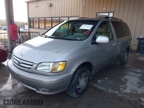 2002 Toyota Sienna LE with VIN 4T3ZF13C72U422993, listed as a IAAI auction lot 41552421 with 260,014 mi miles. Bid and sale history available at carsss.com. Image 2.