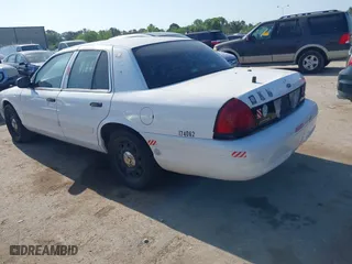 2011 Ford Police Interceptor with VIN 2FABP7BV3BX181983, listed as a IAAI auction lot 42010851 with 101,737 mi miles. Bid and sale history available at carsss.com. Image 3.