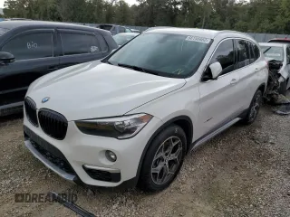 2018 BMW X1 sDrive28i with VIN WBXHU7C38J5H40248, listed as a Copart auction lot 66158662 with 59,903 mi miles. Bid and sale history available at carsss.com. Image 2.
