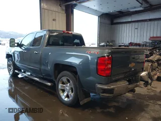 2014 Chevrolet Silverado 1500 LTZ with VIN 1GCVKSEJ2EZ312286, listed as a IAAI auction lot 41496345 with 76,747 mi miles and . Bid and sale history available at DreamBid. Image 3.