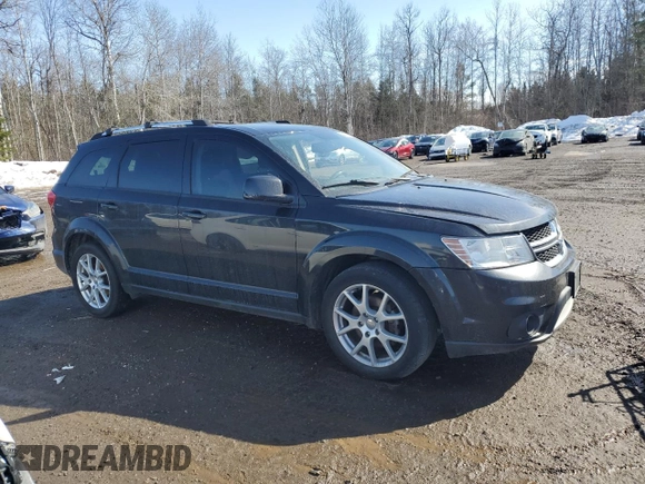 2013 Dodge Journey Crew with VIN 3C4PDCCG8DT701083, listed as a Copart auction lot 48292095 with 129,494 mi miles and Clean title. Bid and sale history available at DreamBid. Image 4.