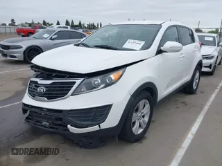 2013 Kia Sportage LX with VIN KNDPBCA21D7356092, listed as a IAAI auction lot 42111086 with 102,521 mi miles and . Bid and sale history available at carsss.com. Image 2.